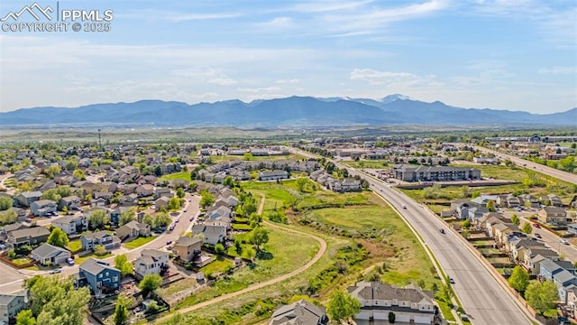 8147 Elk River Vw, Fountain, CO 80817 - aerial view of residential area featuring a mountainous background