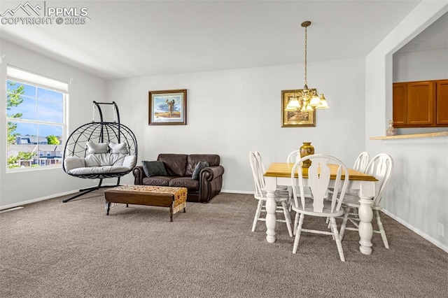 8147 Elk River Vw, Fountain, CO 80817 - carpeted dining space featuring a chandelier and baseboards