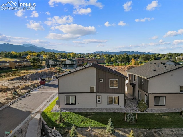 3575 Rosette Grv, Colorado Springs, CO 80910 - aerial view of residential area with mountains