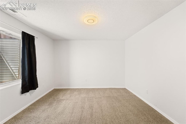 4280 Solarglen Dr, Colorado Springs, CO 80916 - carpeted empty room featuring a textured ceiling and baseboards