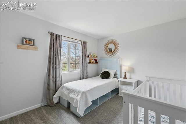 4765 Signal Rock Rd, Colorado Springs, CO 80922 - carpeted bedroom with baseboards