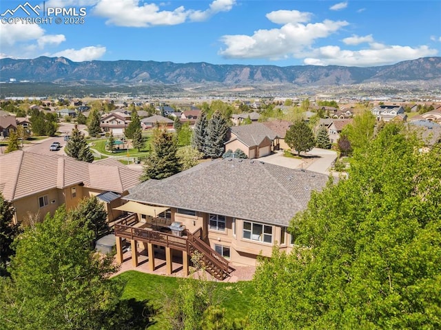 aerial perspective of suburban area with mountains