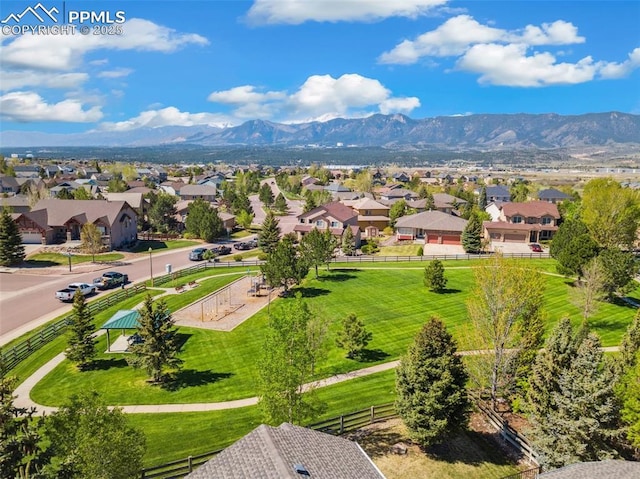 aerial view of residential area with a mountain backdrop