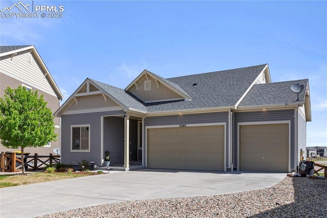 6646 Backcountry Loop, Colorado Springs, CO 80927 - craftsman house with an attached garage, concrete driveway, a shingled roof, and board and batten siding