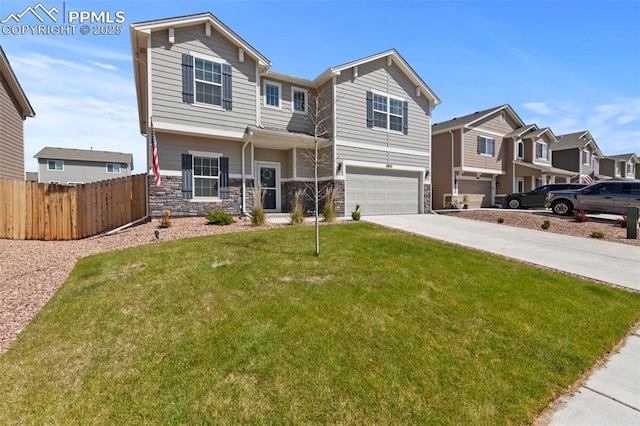 11052 Bossett Dr, Peyton, CO 80831 - view of front of home featuring an attached garage, stone siding, concrete driveway, and a residential view