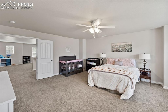 11052 Bossett Dr, Peyton, CO 80831 - carpeted bedroom with baseboards and ceiling fan