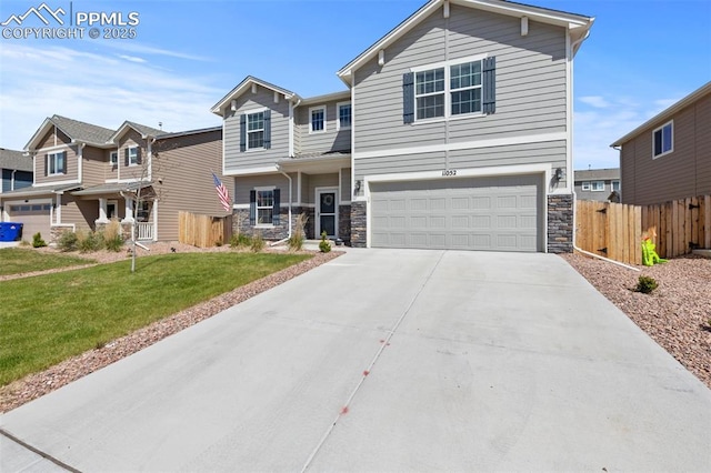 11052 Bossett Dr, Peyton, CO 80831 - view of front of house featuring stone siding, a garage, and concrete driveway