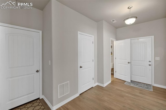 11052 Bossett Dr, Peyton, CO 80831 - entrance foyer featuring baseboards and light wood-type flooring