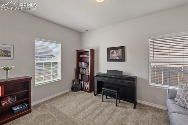 11052 Bossett Dr, Peyton, CO 80831 - sitting room with carpet floors and baseboards