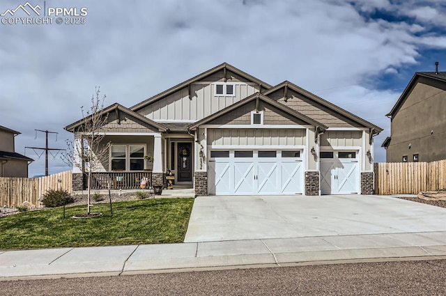 10394 Beckham St, Peyton, CO 80831 - craftsman-style home with board and batten siding, stone siding, and an attached garage