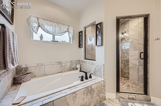 10394 Beckham St, Peyton, CO 80831 - full bathroom with a stall shower and a garden tub