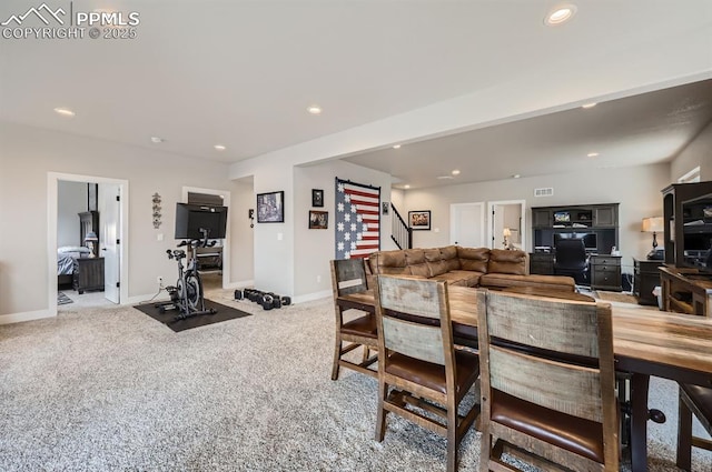 10394 Beckham St, Peyton, CO 80831 - dining room with stairway, baseboards, recessed lighting, and light carpet