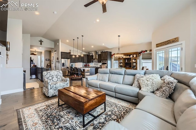 10394 Beckham St, Peyton, CO 80831 - living area with vaulted ceiling, a ceiling fan, wood finished floors, and recessed lighting