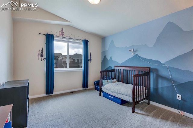 6927 Passing Sky Dr, Colorado Springs, CO 80911 - bedroom featuring lofted ceiling, carpet, and baseboards