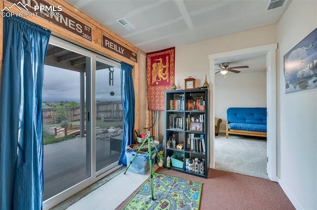 6927 Passing Sky Dr, Colorado Springs, CO 80911 - entryway with carpet and ceiling fan