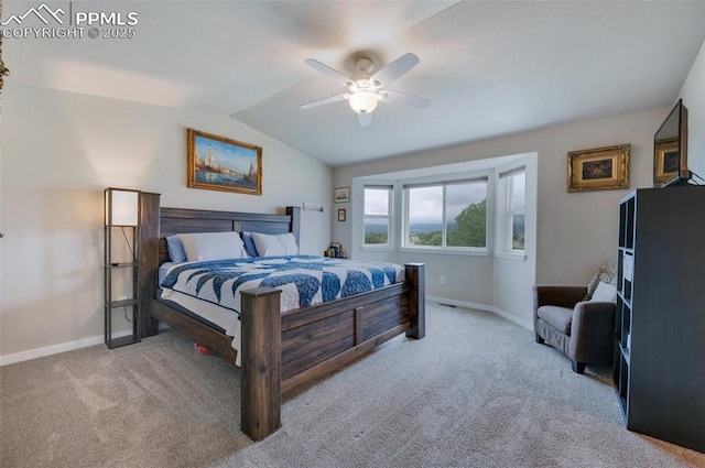 6927 Passing Sky Dr, Colorado Springs, CO 80911 - carpeted bedroom with baseboards, lofted ceiling, and ceiling fan