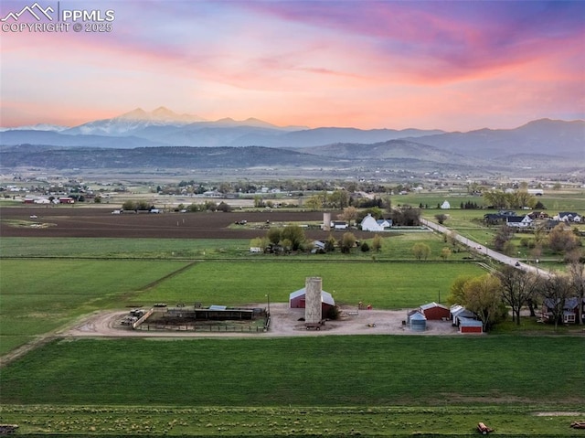 view of mountain background featuring rural landscape