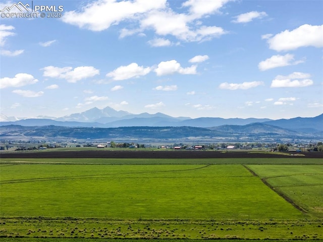 view of mountain background with rural landscape