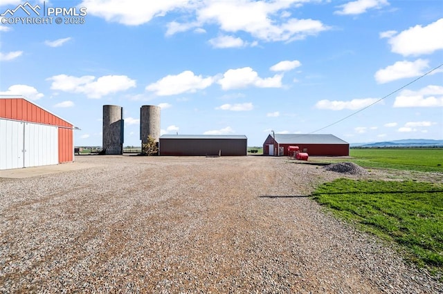 view of yard with an outbuilding and an outdoor structure
