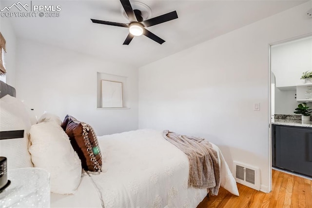 5362 S Cedar St, Littleton, CO 80120 - bedroom featuring light wood-style floors, baseboards, and ceiling fan