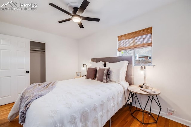 5362 S Cedar St, Littleton, CO 80120 - bedroom with wood finished floors, a closet, a ceiling fan, and baseboards
