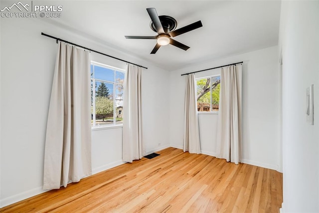 5362 S Cedar St, Littleton, CO 80120 - unfurnished room featuring wood finished floors, a ceiling fan, and baseboards