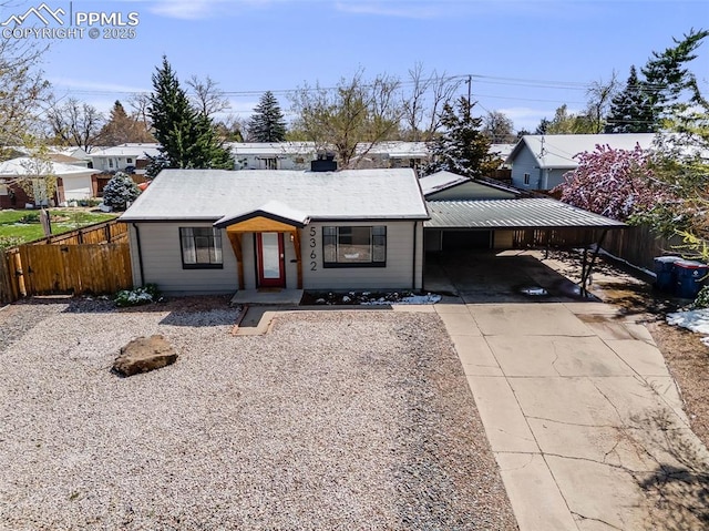 5362 S Cedar St, Littleton, CO 80120 - view of front of house with driveway and a carport