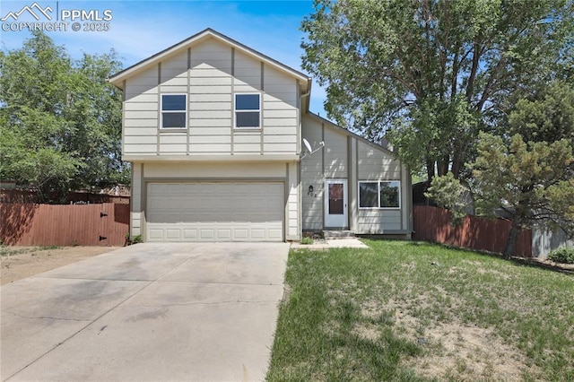 502 Fountain Mesa Rd, Fountain, CO 80817 - view of front facade featuring driveway and an attached garage