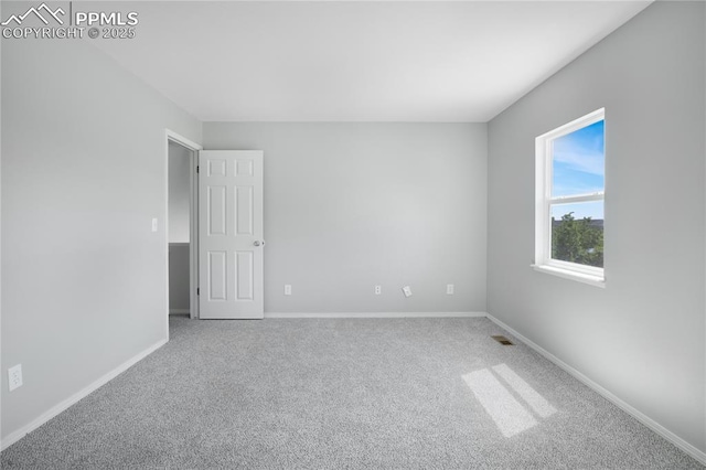 502 Fountain Mesa Rd, Fountain, CO 80817 - carpeted empty room featuring baseboards