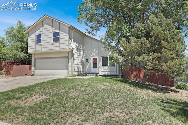 502 Fountain Mesa Rd, Fountain, CO 80817 - view of front of home featuring an attached garage and concrete driveway
