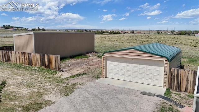 14870 Reiner Ct, Peyton, CO 80831 - detached garage with a view of rural / pastoral area