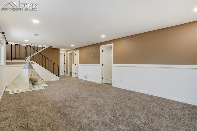 3905 Allgood Dr, Colorado Springs, CO 80911 - unfurnished living room featuring recessed lighting, carpet floors, stairs, and baseboards