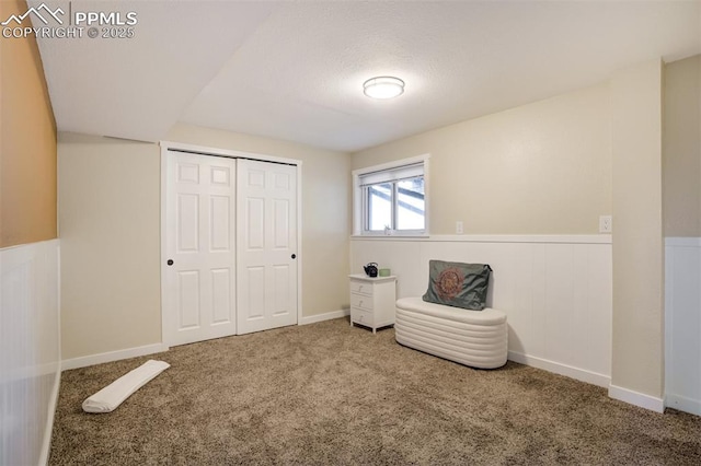 3905 Allgood Dr, Colorado Springs, CO 80911 - unfurnished room with a wainscoted wall and carpet