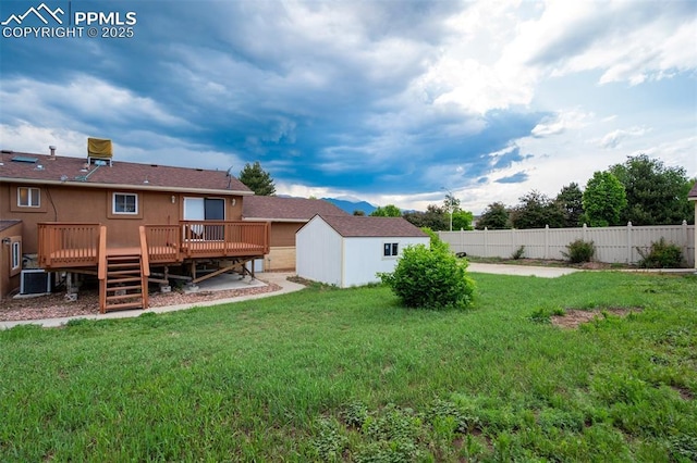 3905 Allgood Dr, Colorado Springs, CO 80911 - view of yard with a wooden deck