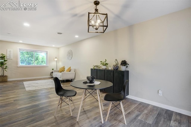 3905 Allgood Dr, Colorado Springs, CO 80911 - dining room featuring wood finished floors, a chandelier, baseboards, and recessed lighting