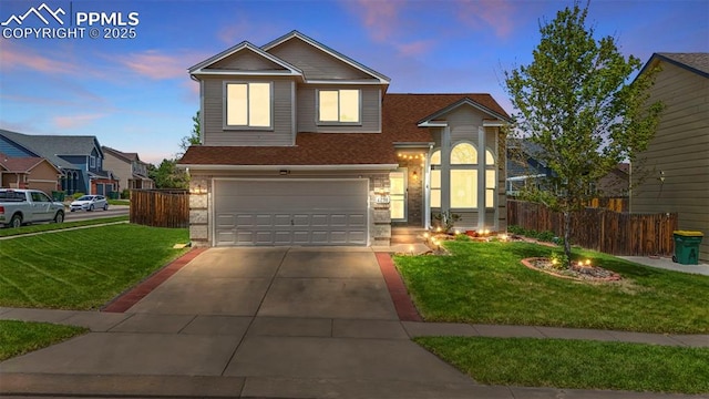 4298 Apache Plume Dr, Colorado Springs, CO 80920 - traditional home featuring an attached garage and driveway