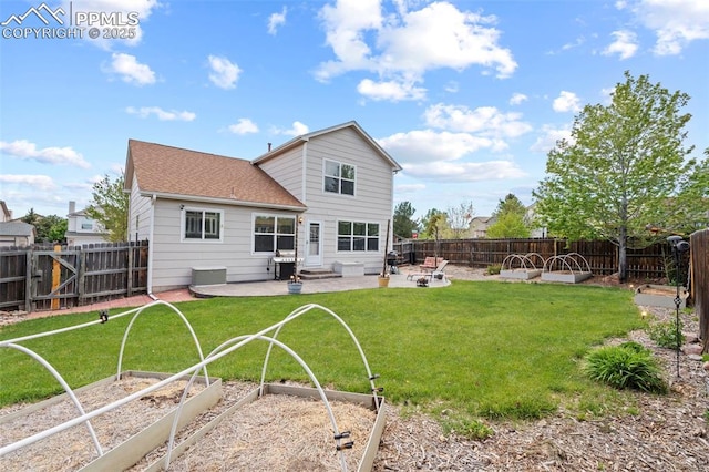 4298 Apache Plume Dr, Colorado Springs, CO 80920 - rear view of house with a garden, a patio, a shingled roof, and entry steps