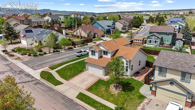 4298 Apache Plume Dr, Colorado Springs, CO 80920 - aerial perspective of suburban area featuring a mountain backdrop