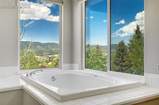 1264 Castle Hills Pl, Colorado Springs, CO 80921 - full bath featuring a bath and a mountain view