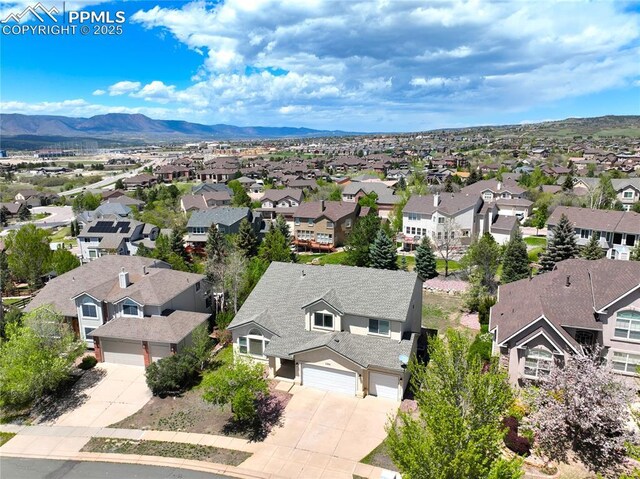 1264 Castle Hills Pl, Colorado Springs, CO 80921 - aerial view of residential area featuring a mountain backdrop