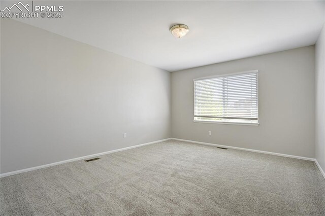 1264 Castle Hills Pl, Colorado Springs, CO 80921 - carpeted spare room with baseboards