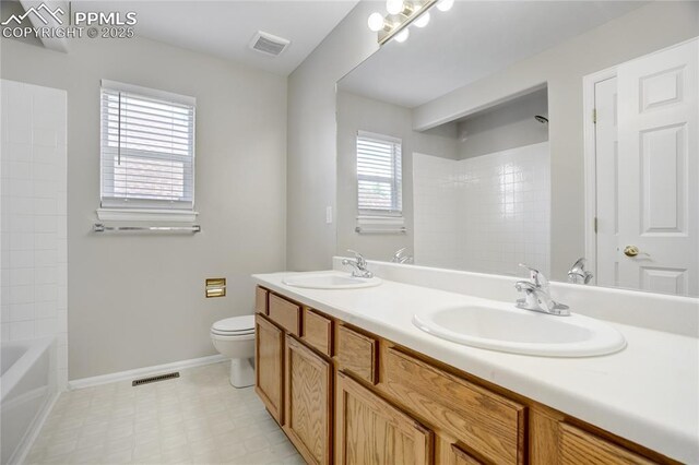1264 Castle Hills Pl, Colorado Springs, CO 80921 - full bath featuring toilet, baseboards, and double vanity