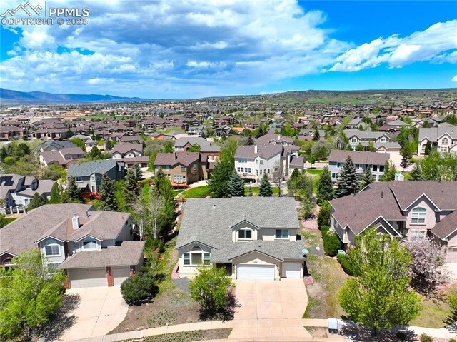1264 Castle Hills Pl, Colorado Springs, CO 80921 - aerial perspective of suburban area with mountains