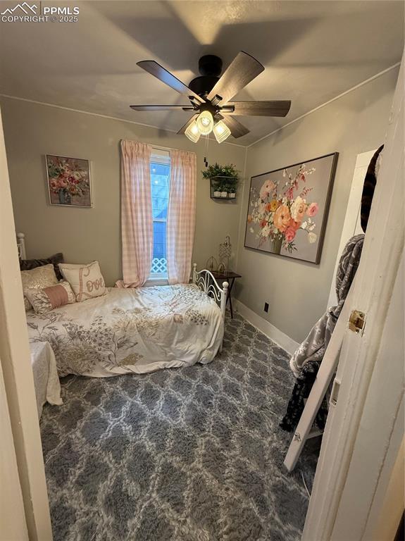 2932 W Kiowa St, Colorado Springs, CO 80904 - bedroom with carpet floors, a ceiling fan, and baseboards