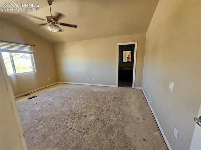 6282 Pilgrimage Rd, Colorado Springs, CO 80925 - spare room with a ceiling fan, lofted ceiling, and a textured ceiling