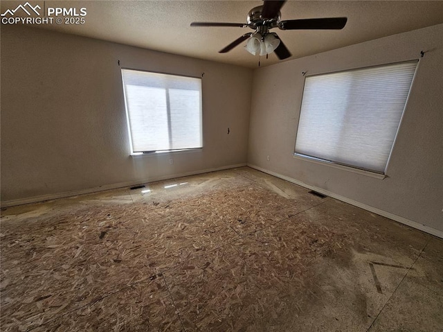 6282 Pilgrimage Rd, Colorado Springs, CO 80925 - empty room with ceiling fan, baseboards, and a textured ceiling