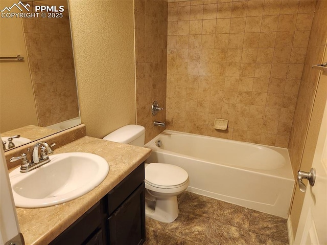 6282 Pilgrimage Rd, Colorado Springs, CO 80925 - bathroom featuring a textured wall, toilet, vanity, and shower / washtub combination