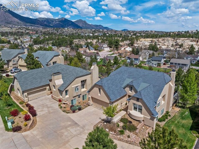 aerial view of residential area with a mountain backdrop