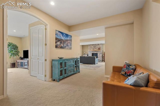 hall with carpet floors, baseboards, and recessed lighting