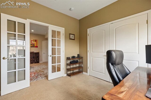 office space with french doors and carpet floors